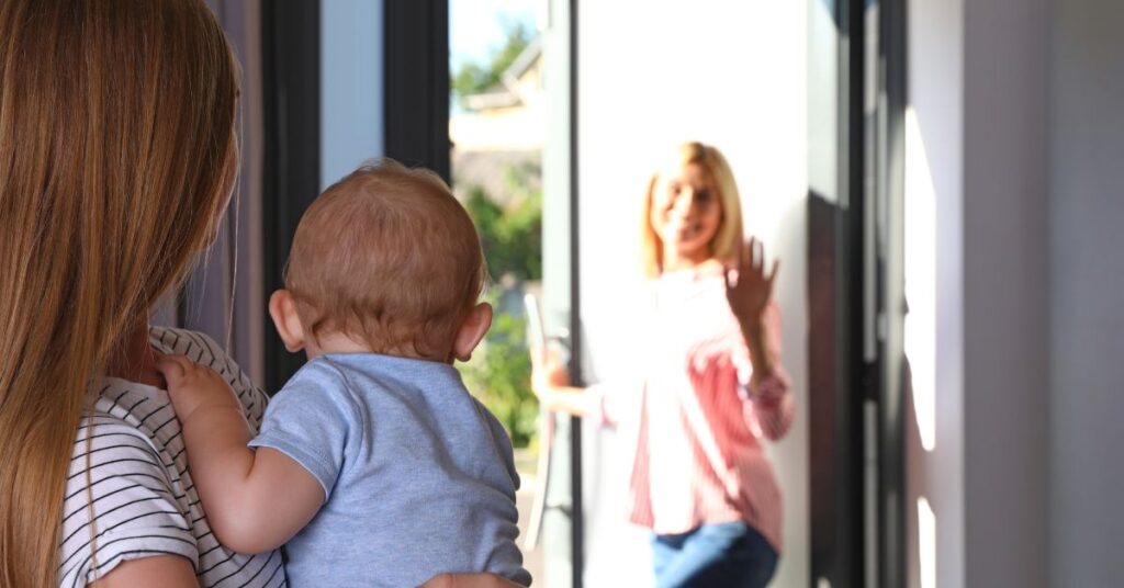 woman waving bye to nanny leaving her baby in her care. service provded by healkin Nanny Services for Baby in Mumbai